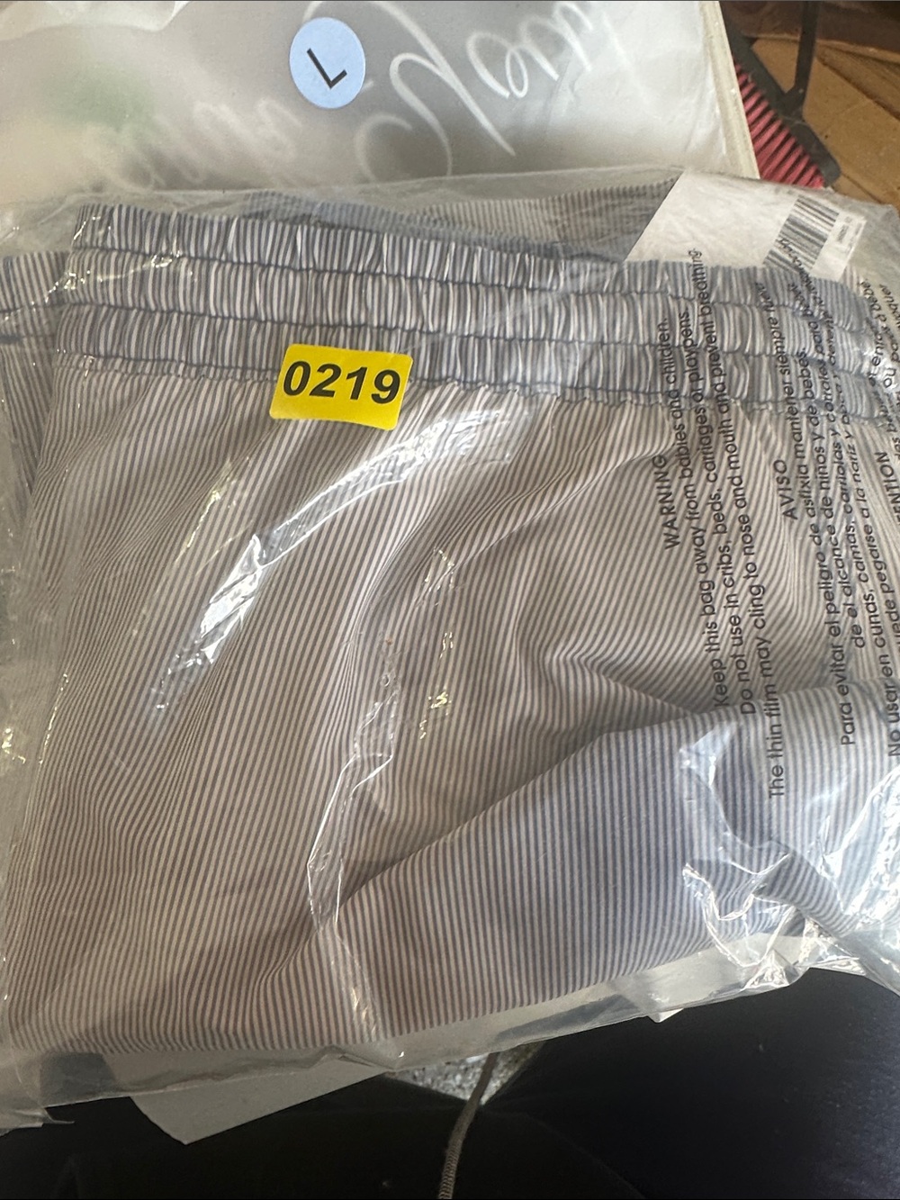 Quince Men’s Swim Trunks in Light Blue and White Pinstripe